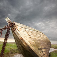 Outside the village of Glasson Docks a number of old fishing boats have been laid to rest.