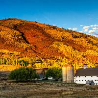 Caught at dawn with peak fall colors raging in the background.