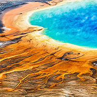 The largest geyser in Yellowstone and by far the most colorful. 