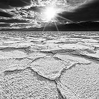 The salt flats at Bad Water in Death Valley are 40 miles long and about 5 miles wide. 200+ plus feet below sea level and one of the more surreal places I\'ve been.