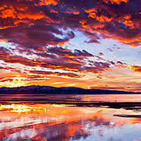 This sunset was a truly surreal event to behold. The orange glow of the sky was the most vivid I've ever seen it. Add in the skies reflection off the Great Salt Lake and I couldn't have been happier!