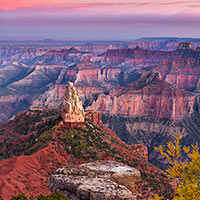 Taken from Point Imperial on the north rim of the Grand Canyon. Fall foliage in foreground compliments the pastels of the sky as the sky changes from day to dusk.