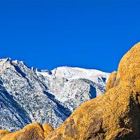 Americas highest peak is seen alongside one of the Eastern Sierra's most striking natural arches. 